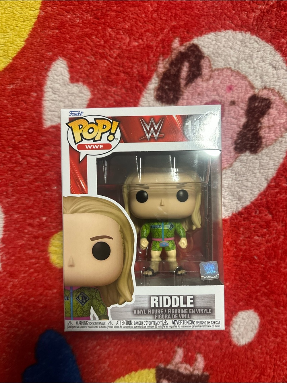 Funko WWE Riddle Pop! Figure in Green and Purple Outfit